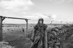 Flavia checking for breaches along the predator proof fence, Tiverton