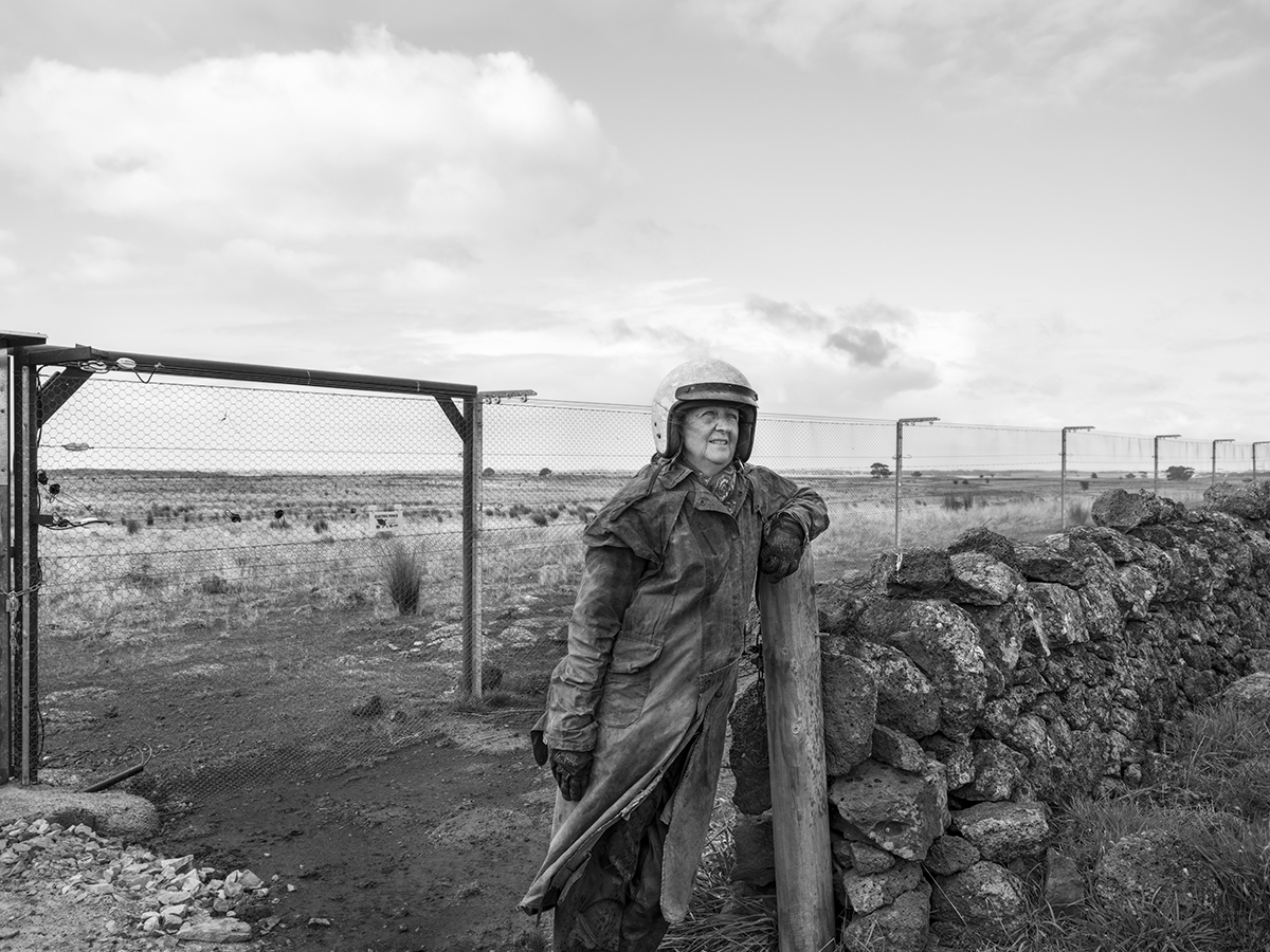 Tracy Ponich: Portrait of Flavia checking for breaches along the predator proof fence